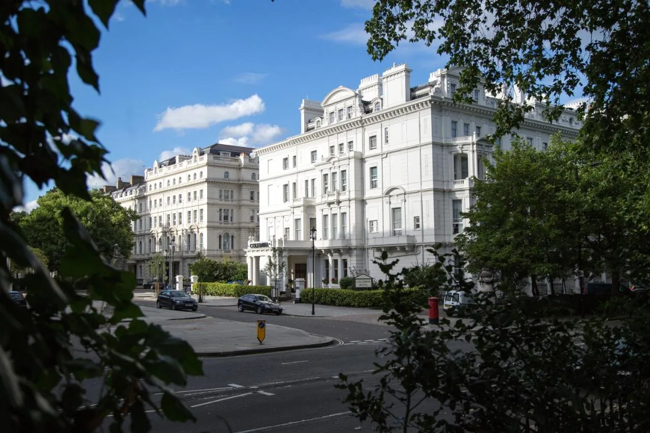 The white-fronted exterior of The Columbia Hotel on Lancaster Gate, London